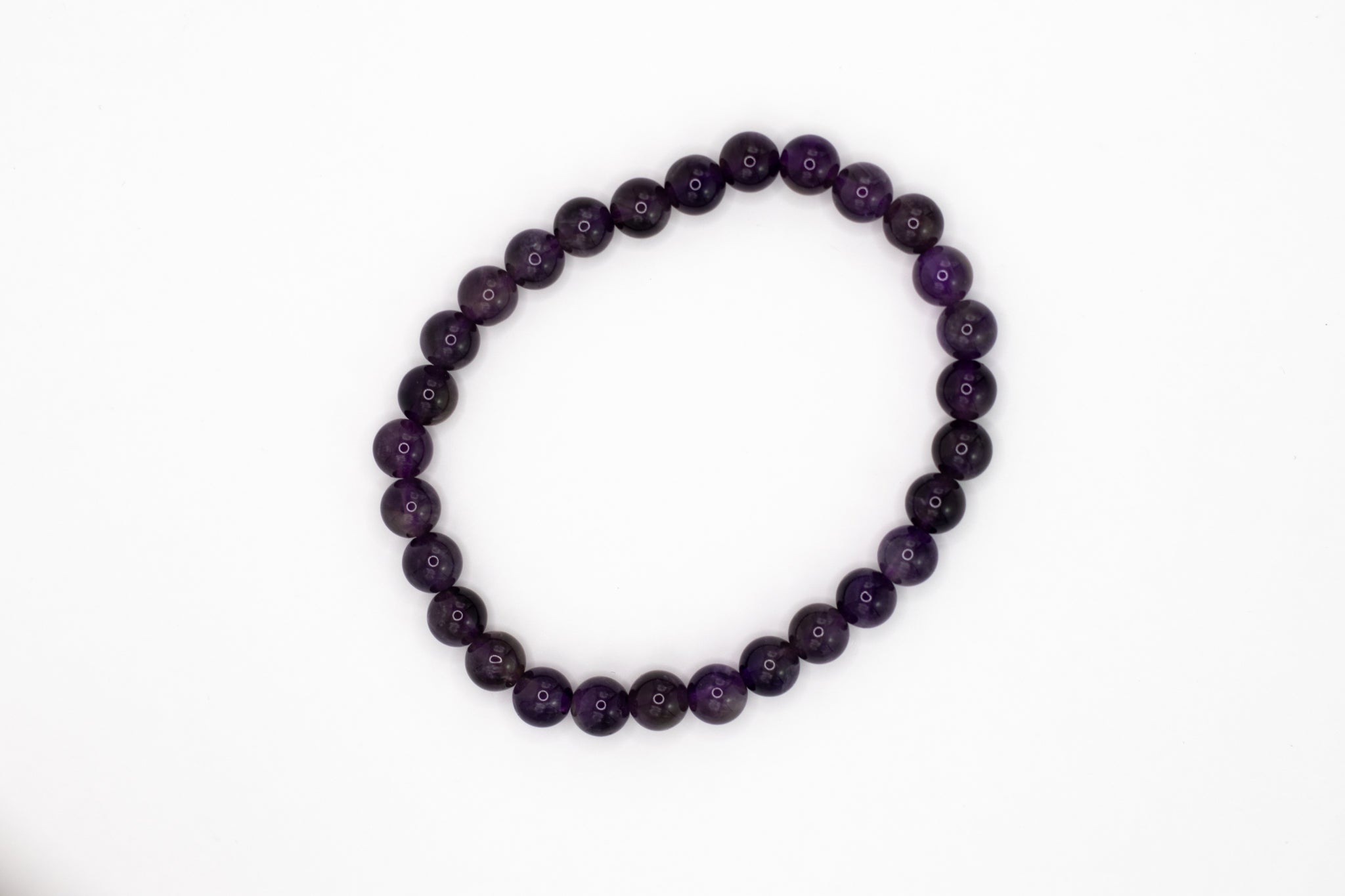Flexibles Amethyst Kugelarmband (6 mm) aus AA-Qualität, fördert geistige Klarheit und inneren Frieden.