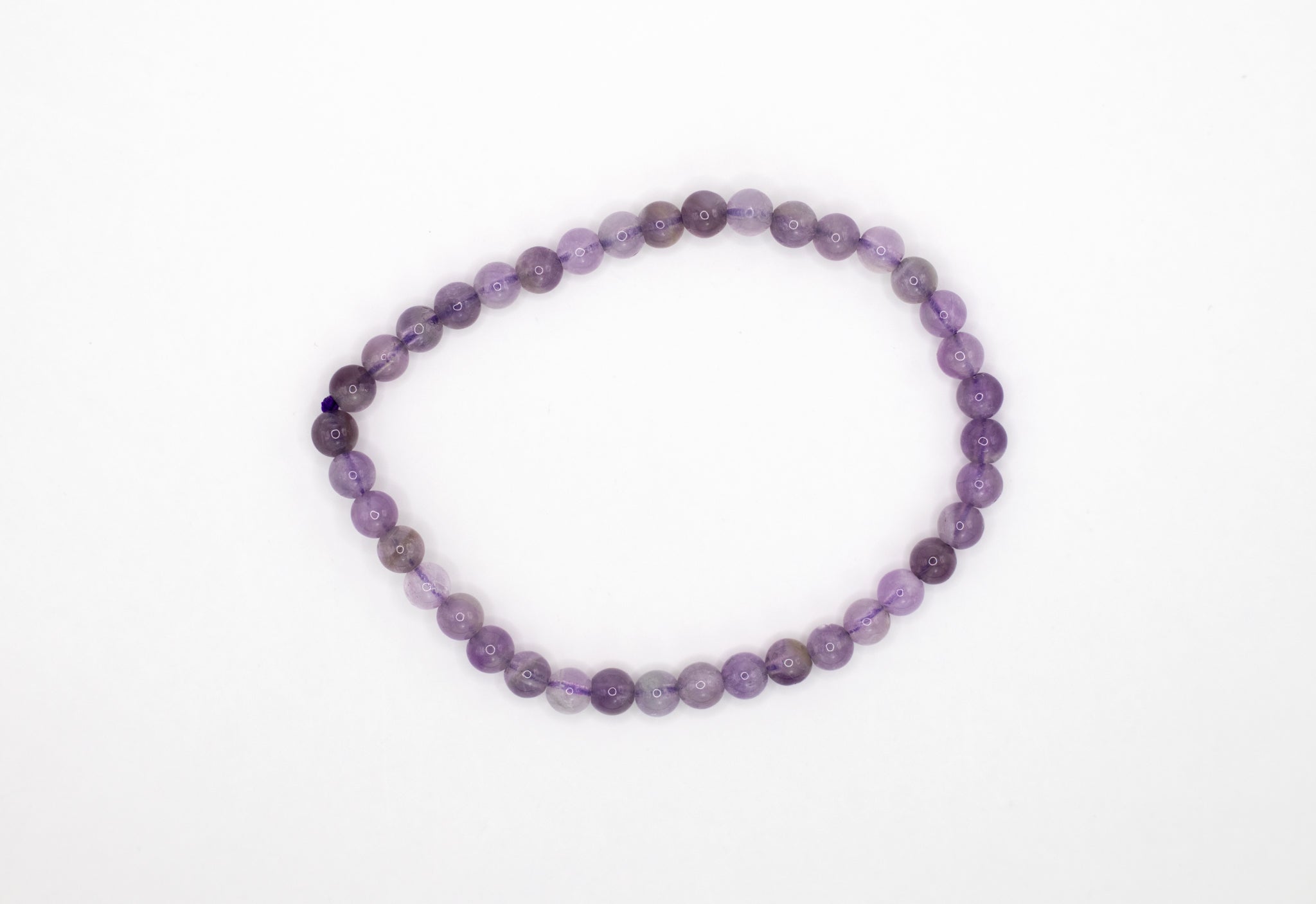 Flexibles Amethyst Kugelarmband (5 mm) aus A-Qualität, fördert geistige Klarheit und inneren Frieden.